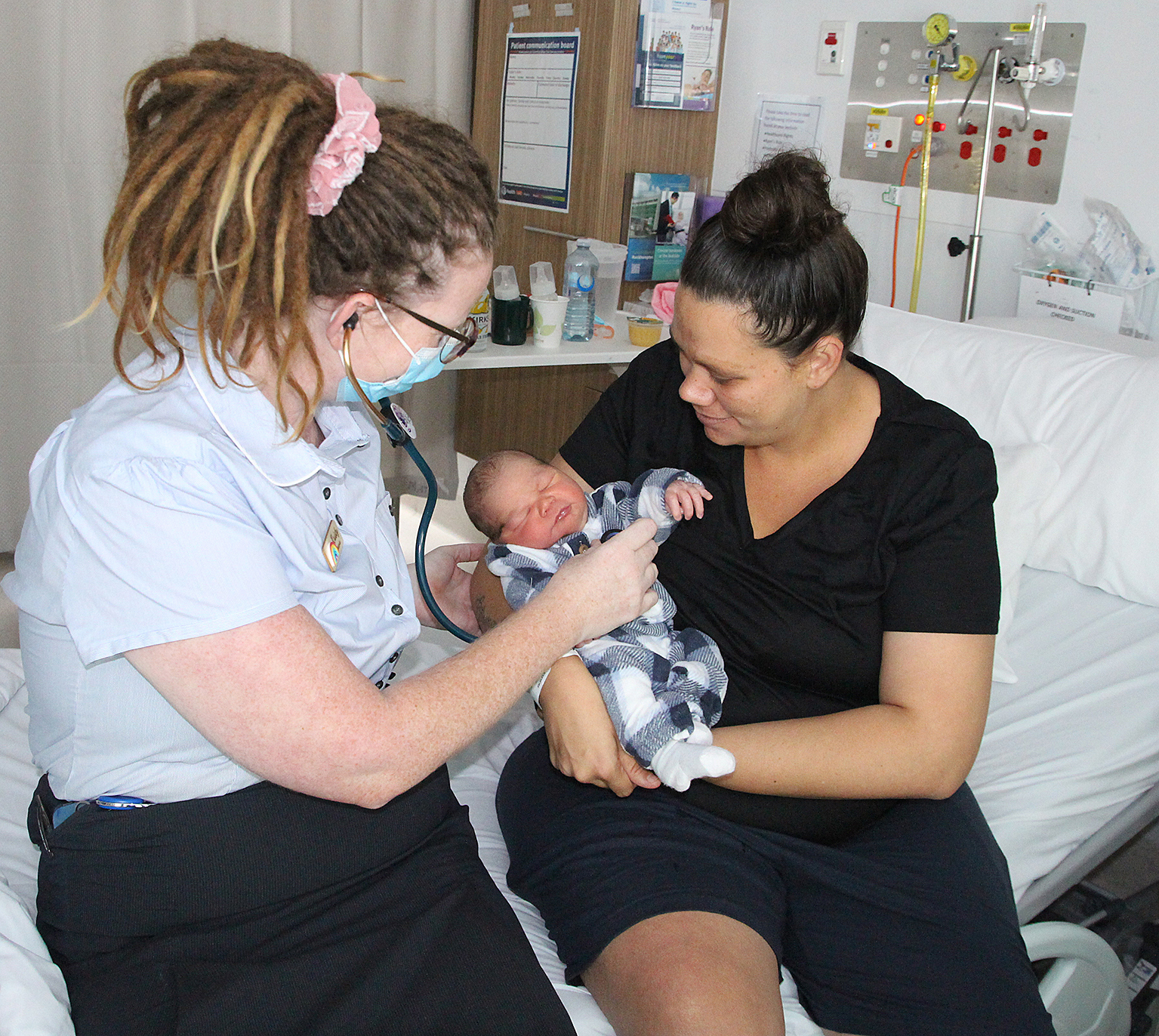 USC Midwife graduate Kristy Benson, with mum Hayley Gyemore and baby Steven at Rockhampton Hospital 