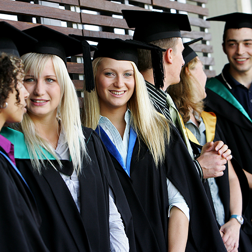 A group of students in graduation gowns