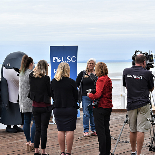 Dr Kathy Townsend is interviewed by media about marine debris at the launch of Ocean Festival.