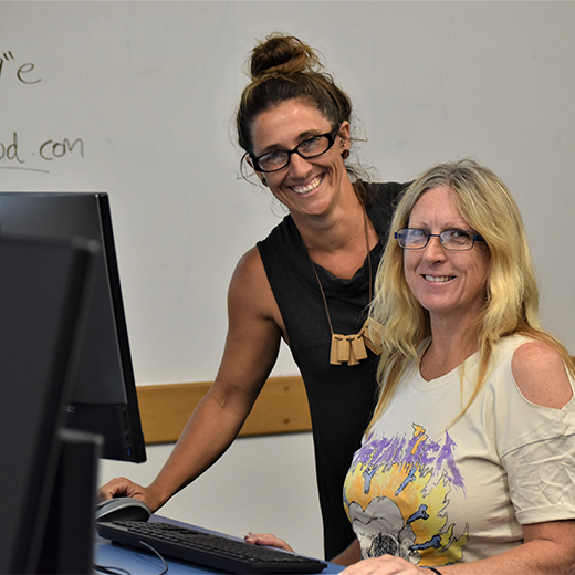 Diploma student Carolyn O’Donnell with USC adviser Liz Davison at a recent University Skills for Community course at USC’s Fraser Coast campus