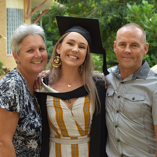 Ashley Black with her parents Kasey and Mark Black at her USC graduation ceremony at the Sunshine Coast today