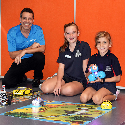 Pialba State School students Sienna Piggott and Mia Kenny with USC Education Lecturer Dr David Martin.