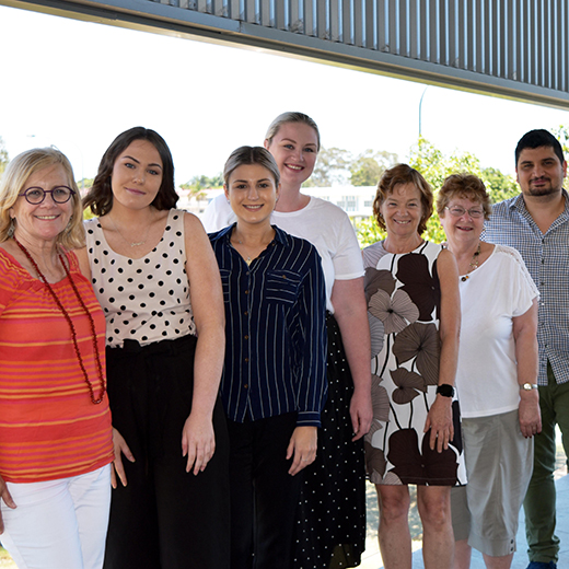 USC Fraser Coast students, Dr Shahab Pourfakhimi and members of the Maryborough Mural Project committee.