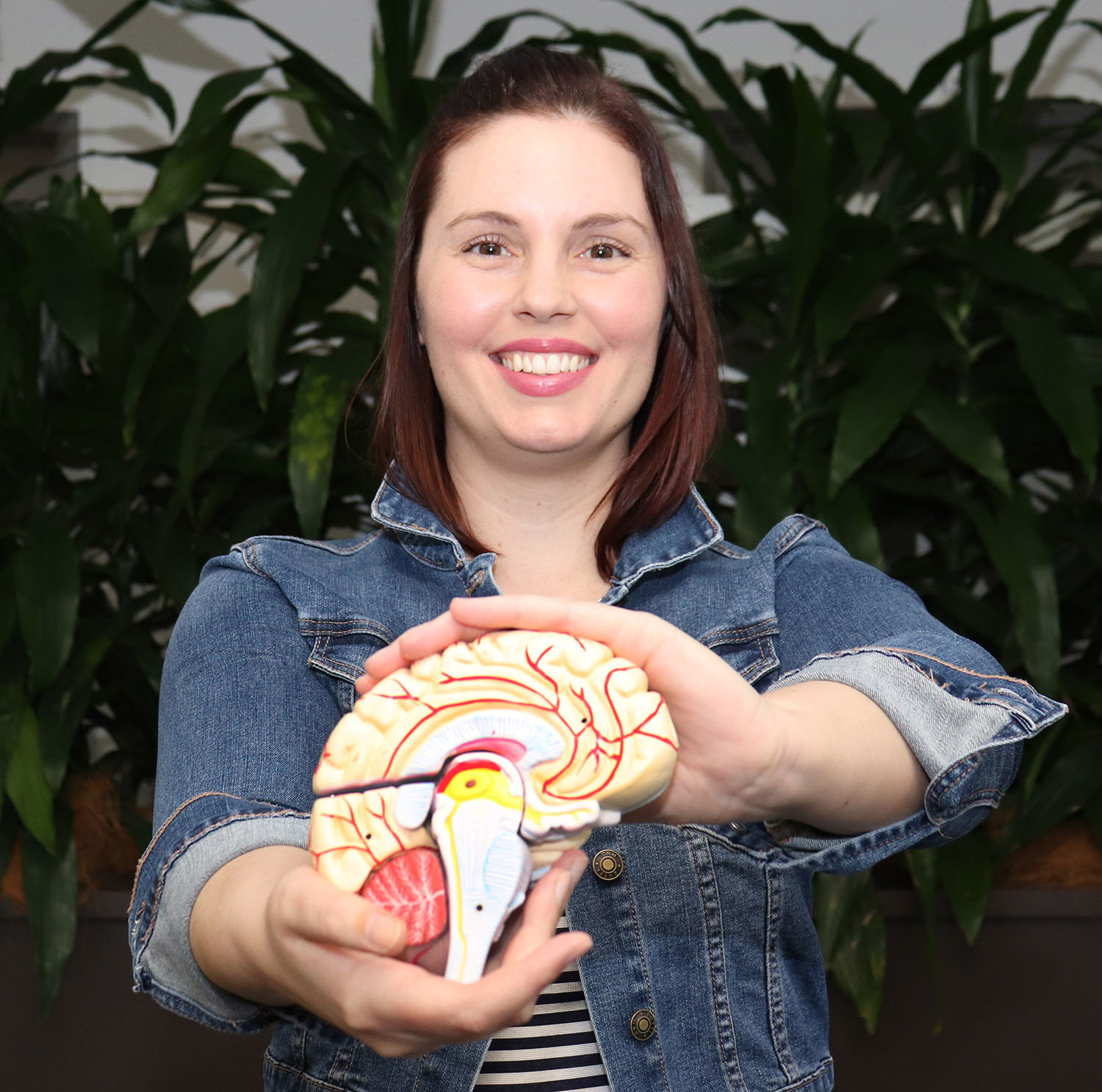 Amanda Boyes holds brain model