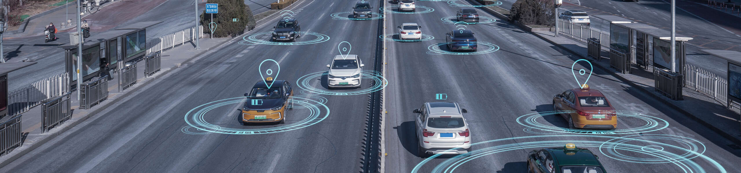 birds eye view of cars driving on highway transmitting data like location 