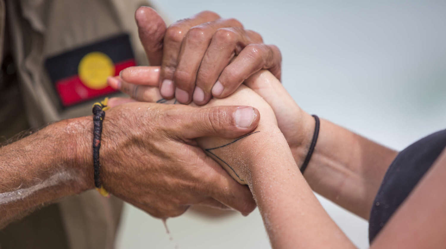 two people holding hands