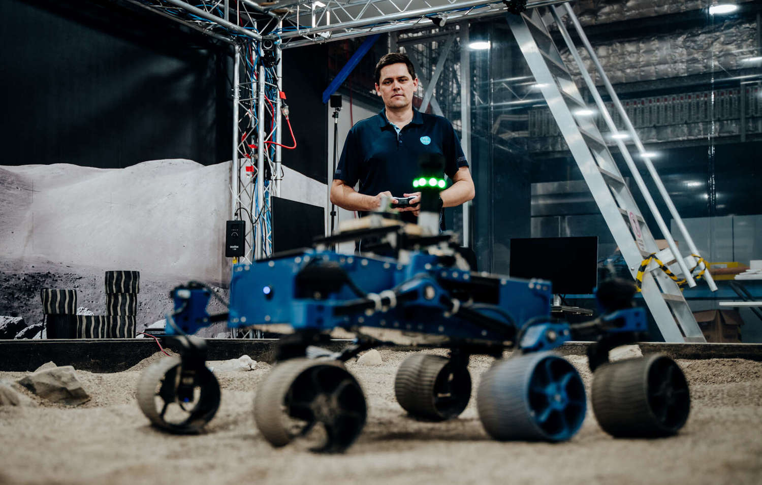 Michael Tedge operating robot vehicle at csiro